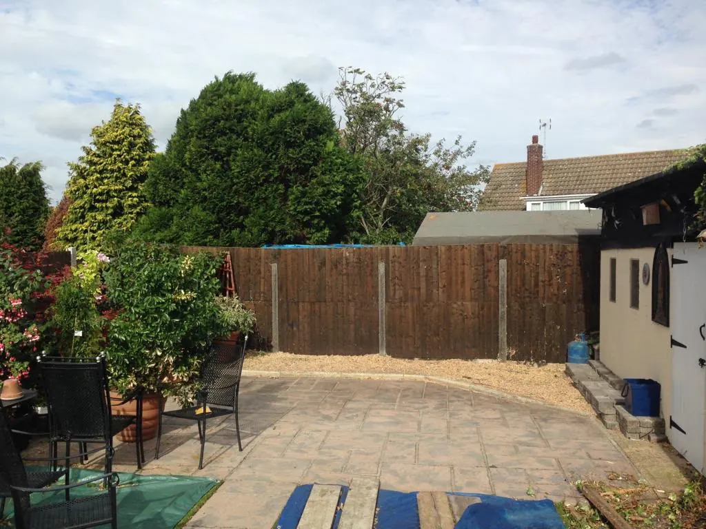 Block-paved patio and garden left clean and swept after tree work by Newton's Tree Services